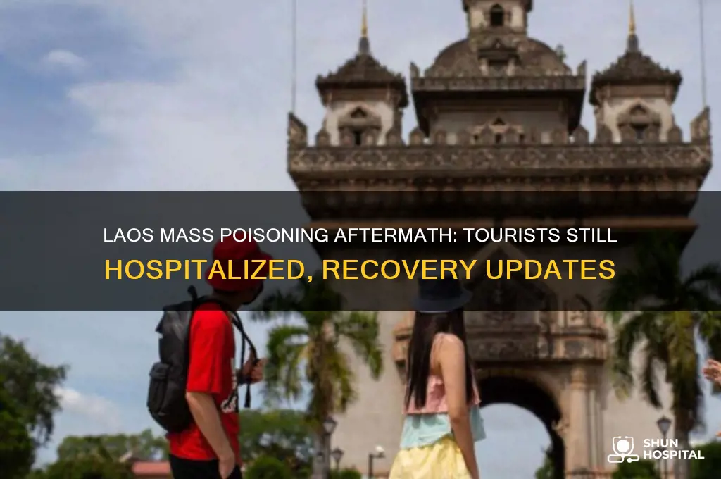how many tourist still in hospital in laos mass poisoning