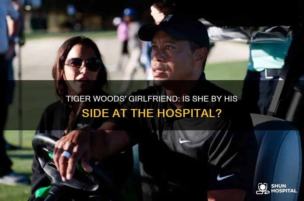 is tiger woods girlfriend with him at the hospital