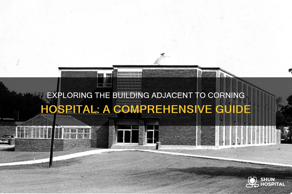 what is the building located next to corning hospital