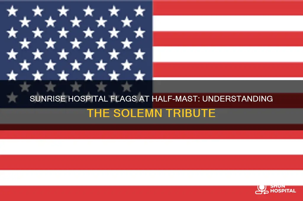 why are the flags flying half mast at sunrise hospital