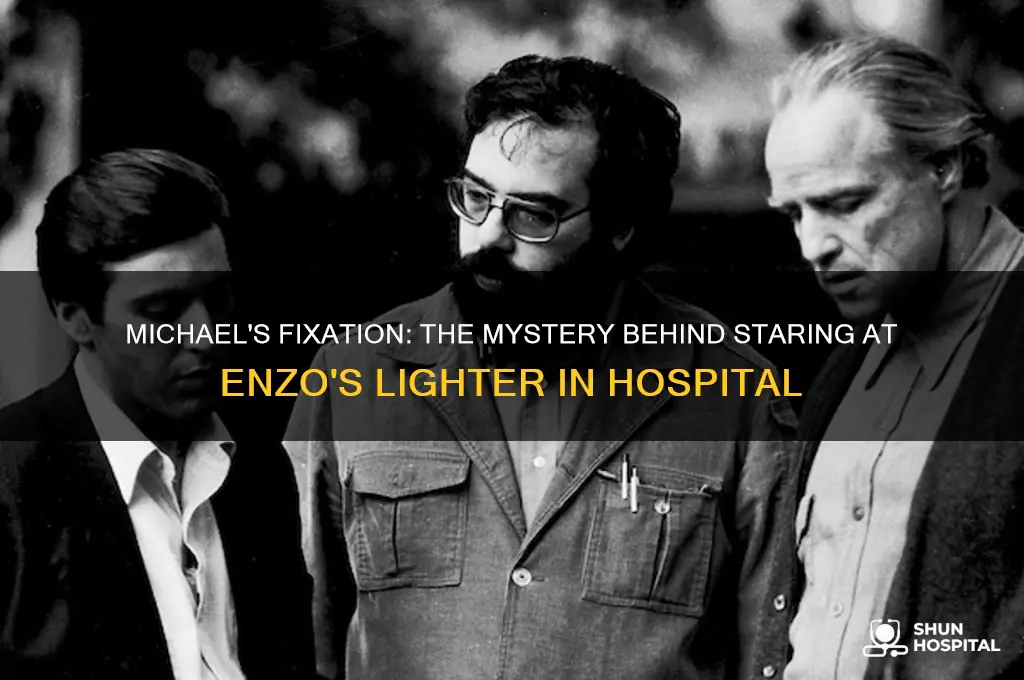 why dod muchael stare at enzos lighter at hospital